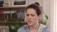 A female patient talking in an office
